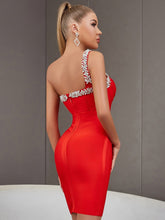Robe bandage asymétrique à strass Sonia